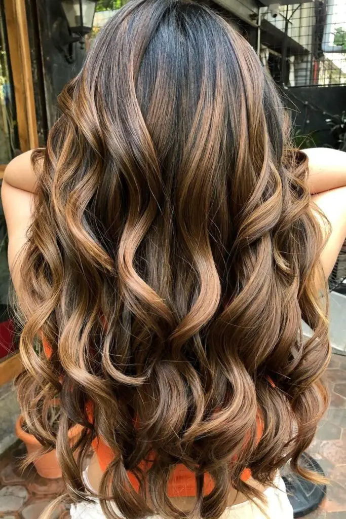 Light caramel and amber tones cascading.