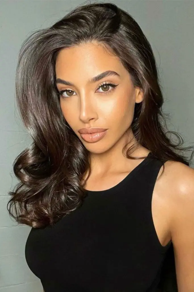 Full blowout with bounce and glam.