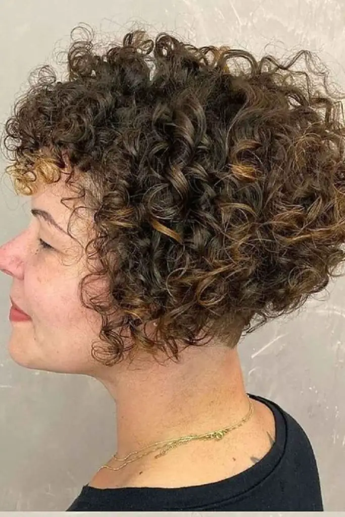 Soft curls in stacked, voluminous style.