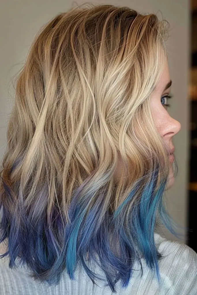 Bold dip-dye adds playful flair to hair.