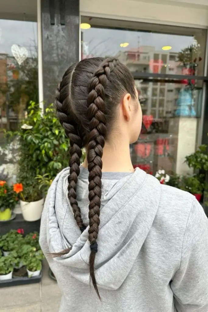 Raised Dutch braid showcasing playful sophistication.