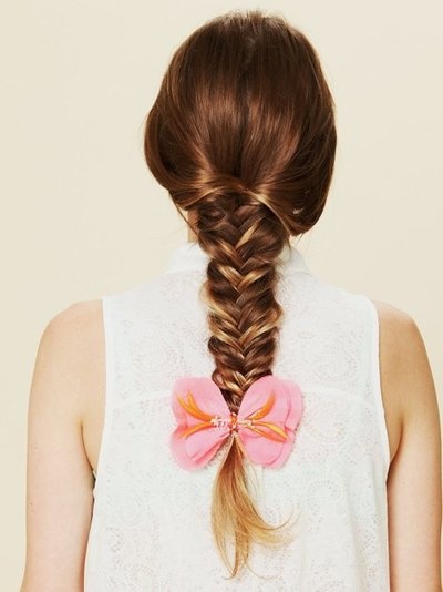 Fishtail braid topped with romantic bow.