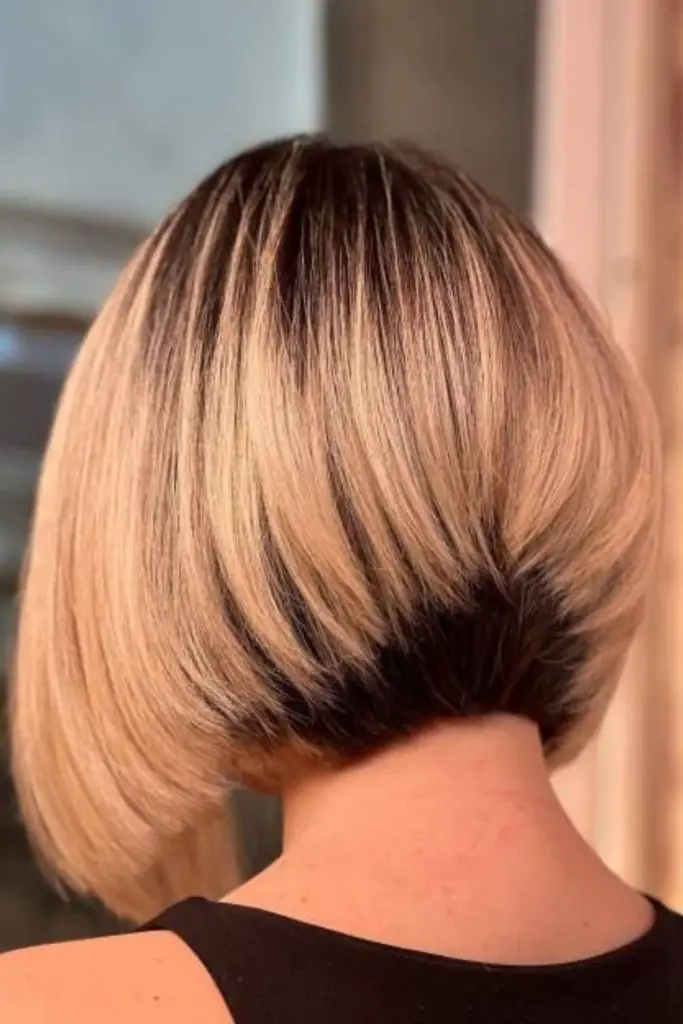 Tapered stack for refined, smooth silhouette.
