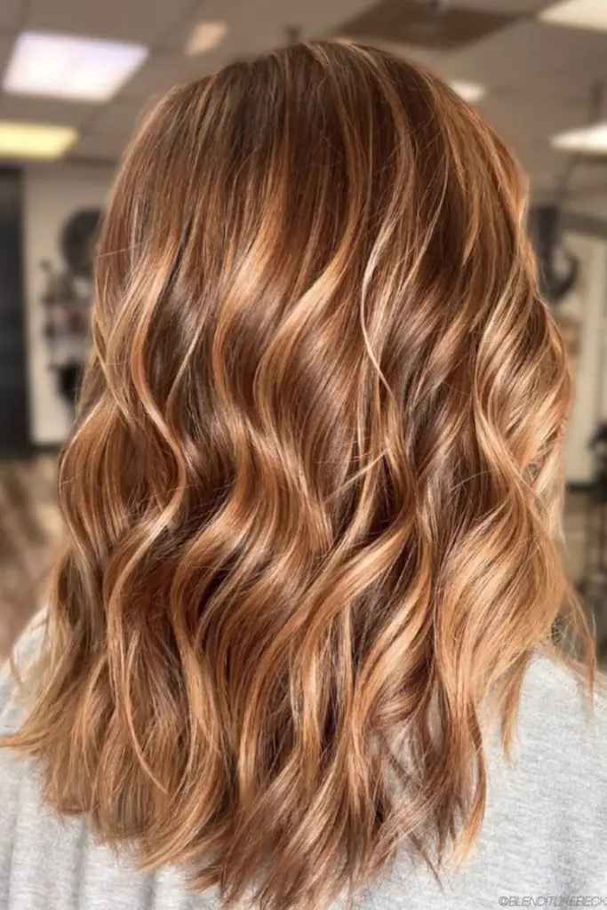 Soft maple hues warm up blonde hair.