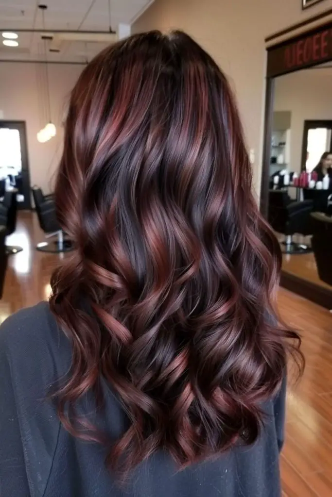 Mocha roots with soft rose accents.