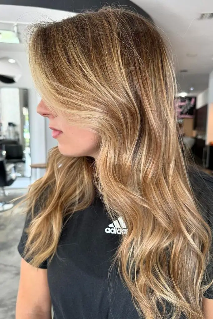 Relaxed, beachy caramel and blonde tones.