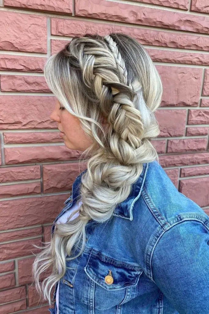 Stylish side braid enhancing casual flair.