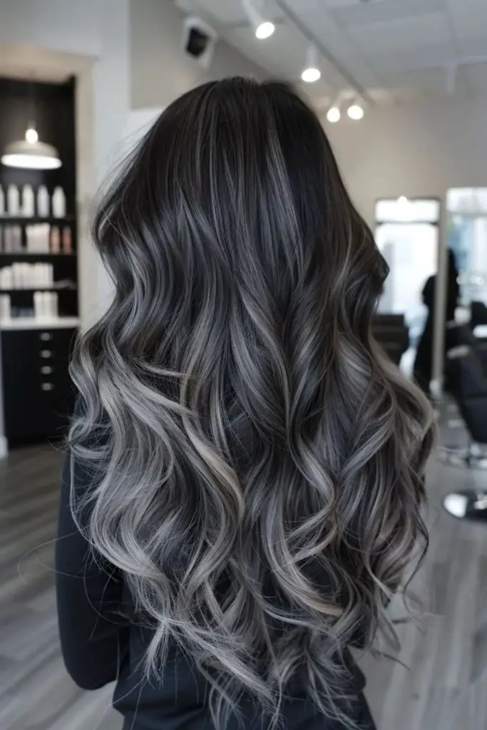 Jet black hair with silver highlights.