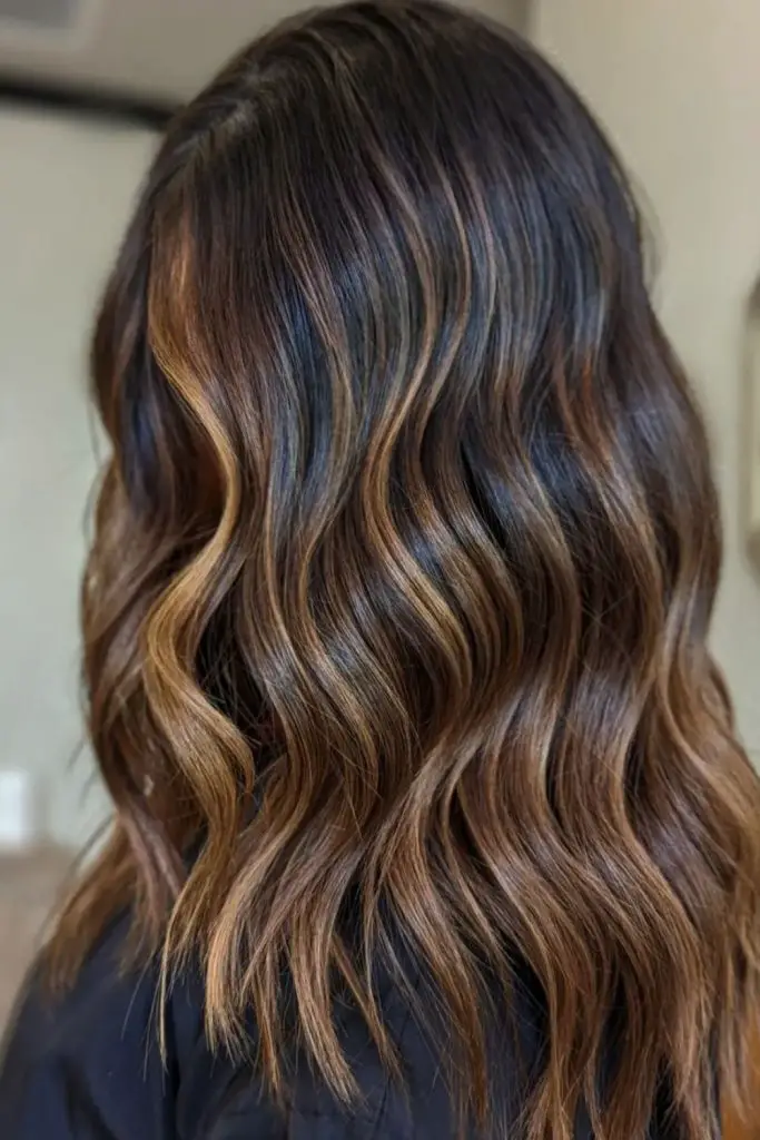 Playful caramel with soft blonde highlights.