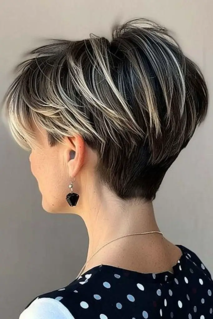 Tapered pixie stack with soft layers.