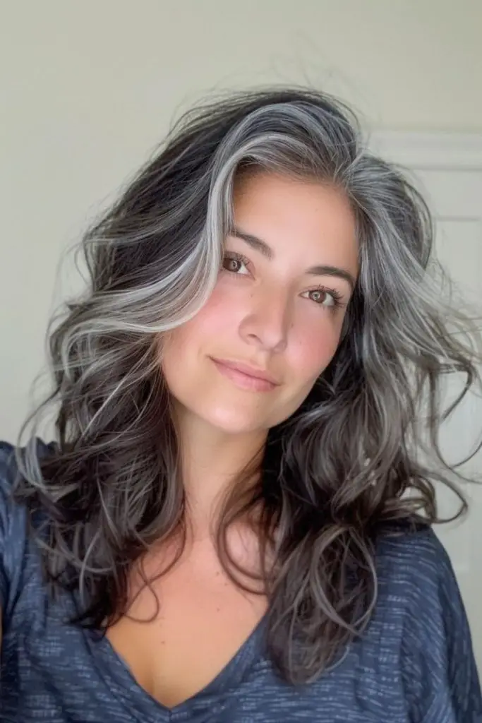 Midnight black and silver hair contrast.