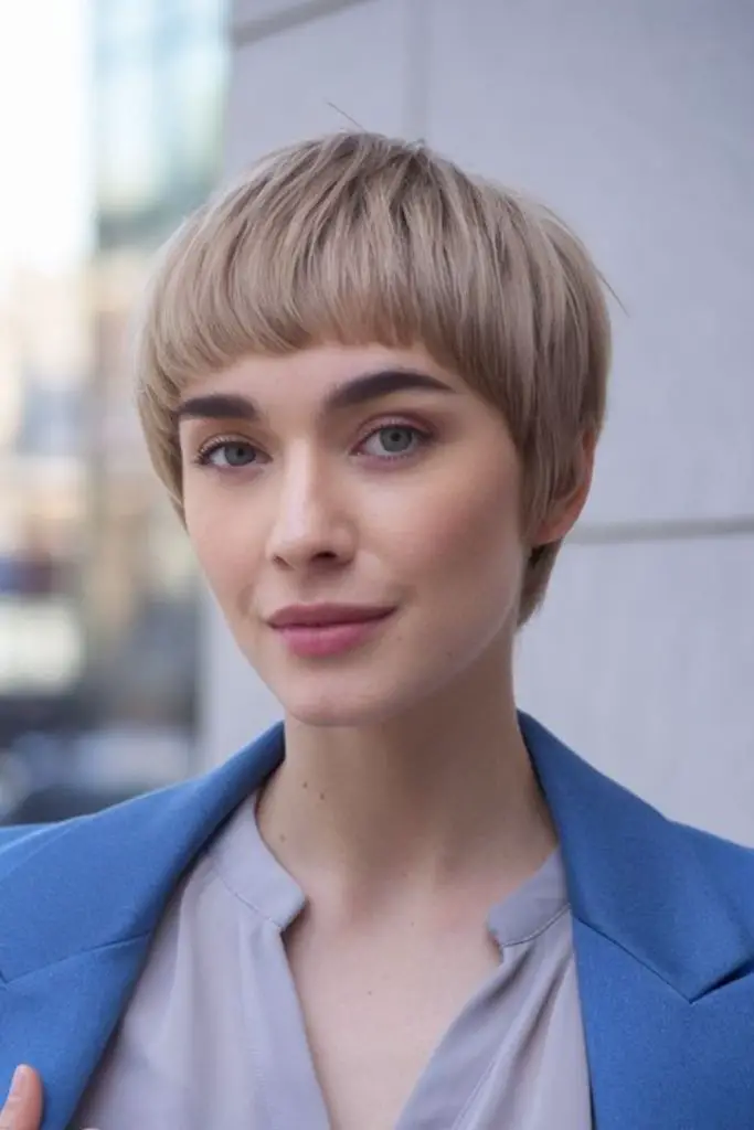 Retro-inspired rounded bowl pixie style.