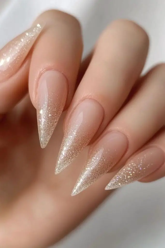 "Pearl nails adorned with tiny bubbles."
