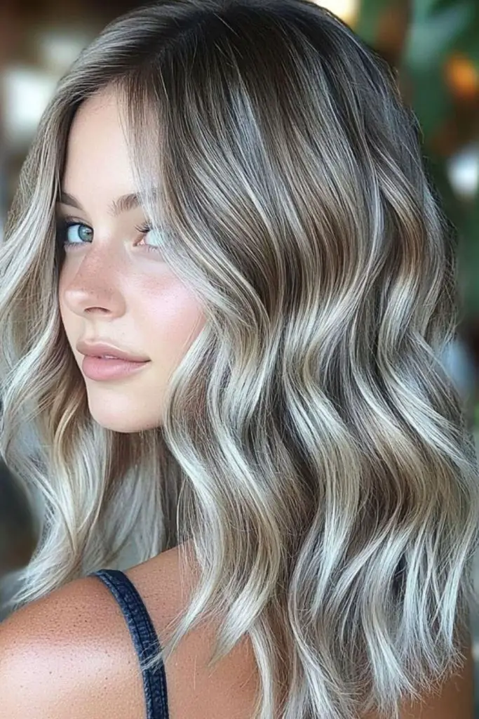 "Dark blonde hair with grey undertones."