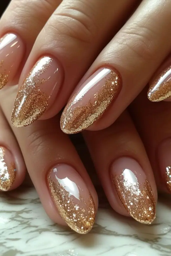 "Shimmering gold nails reflecting party lights."