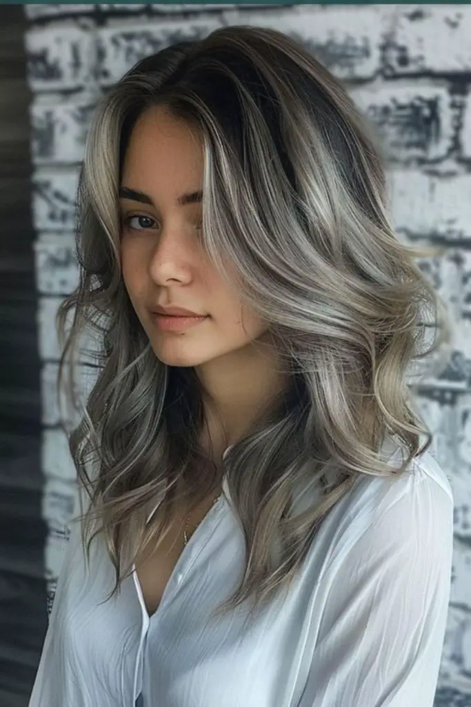 "Light blonde with dramatic grey streaks."