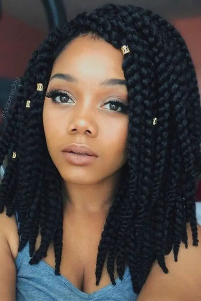 "Textured look combining thin and thick twists."