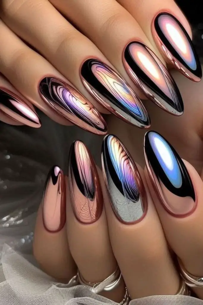 "Dark nails glowing with metallic accents."