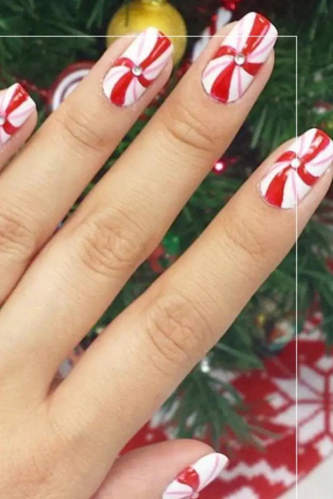 Candy-inspired nails in pink and red.