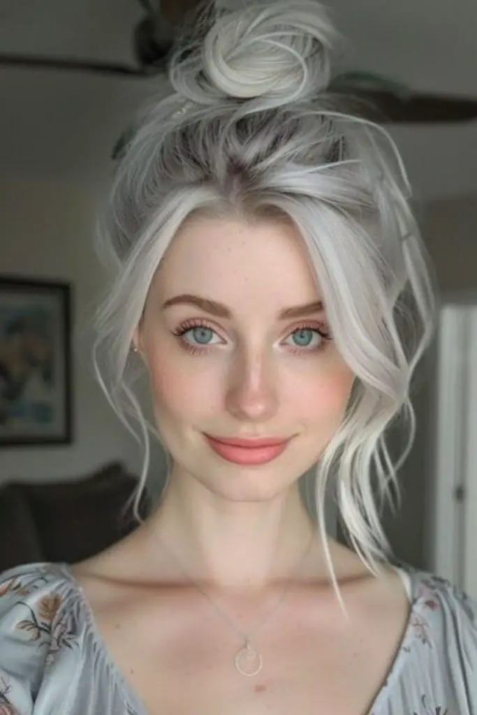 "Platinum blonde with smoky grey streaks."