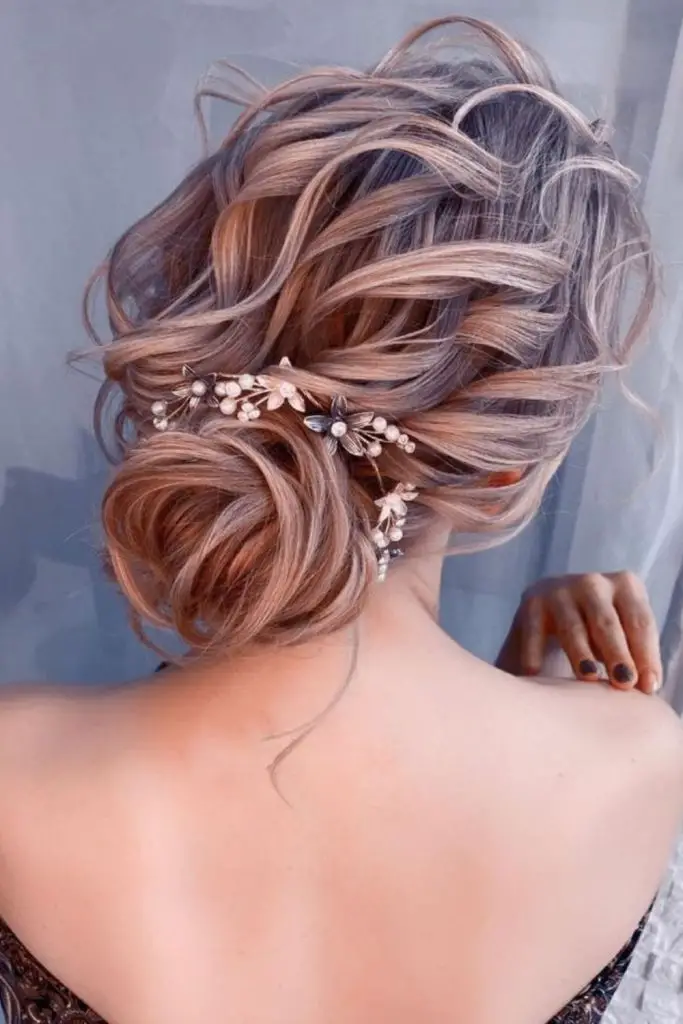 Loose tendrils add softness to updos.