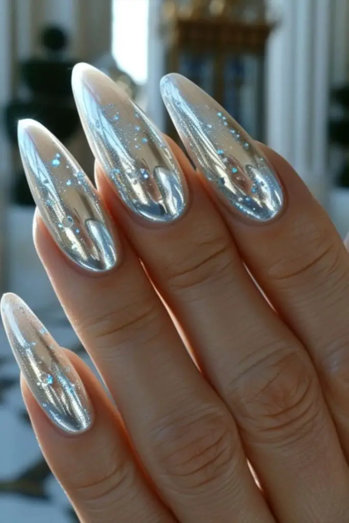 "Shiny silver nails reflecting strobe beams."