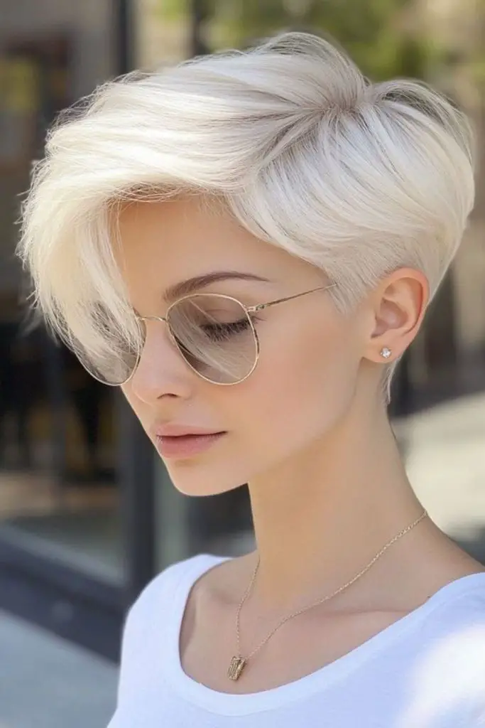 Polished pixie with side part elegance.