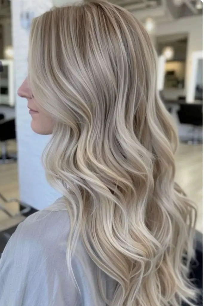 "Honey blonde with cool grey streaks."