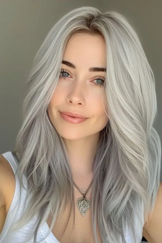 "Bright white blonde with grey streaks."