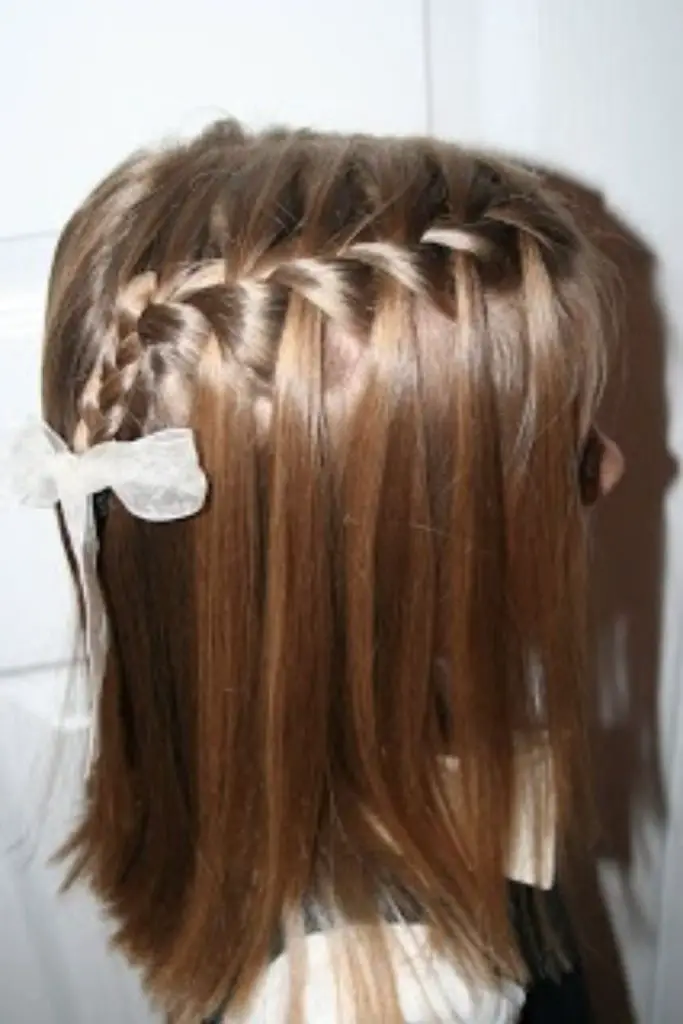 Flowing waterfall braid for toddler girls.