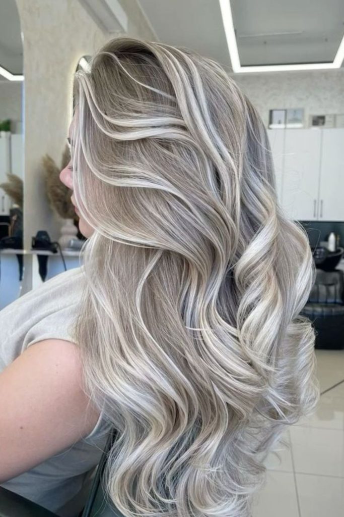 Platinum interwoven with ethereal ash waves.