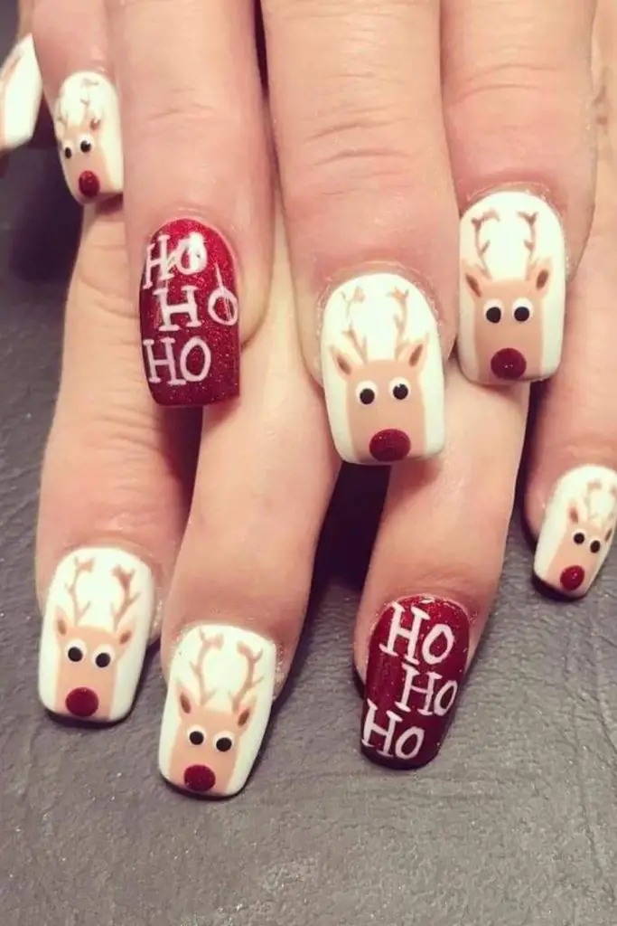 Rudolph-themed nails with red noses.