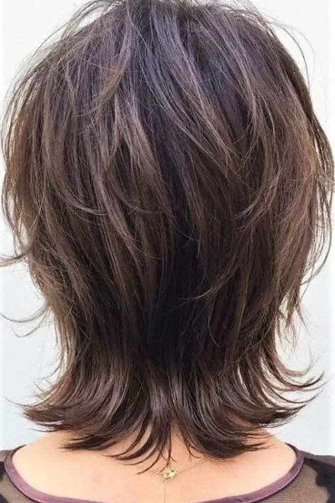 Messy, layered crop with rock vibe.