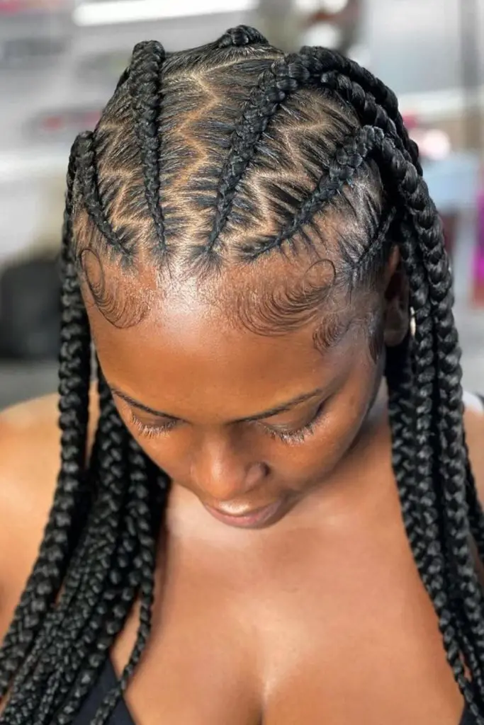Unique zigzag parting in classic braids.