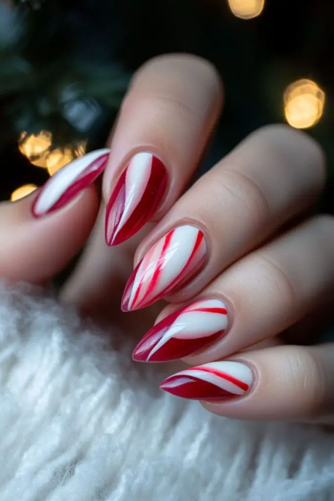 Red and white candy stripe nails.