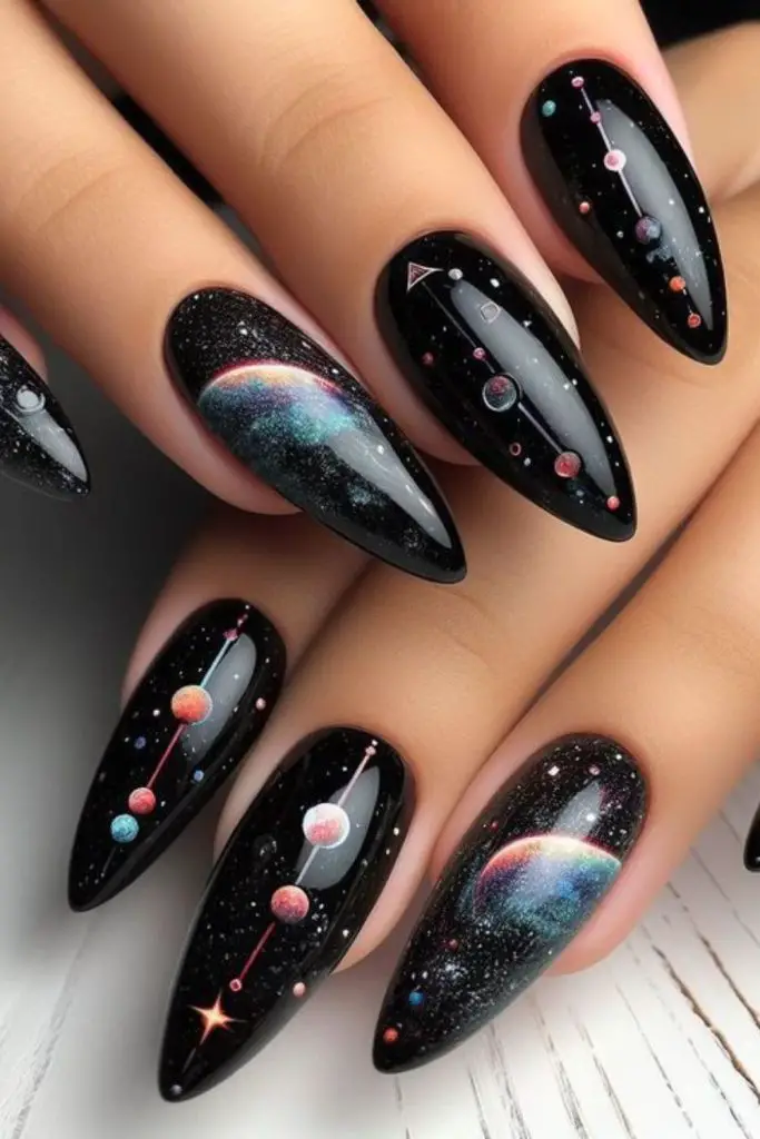 Black nails with holographic glittery accents.