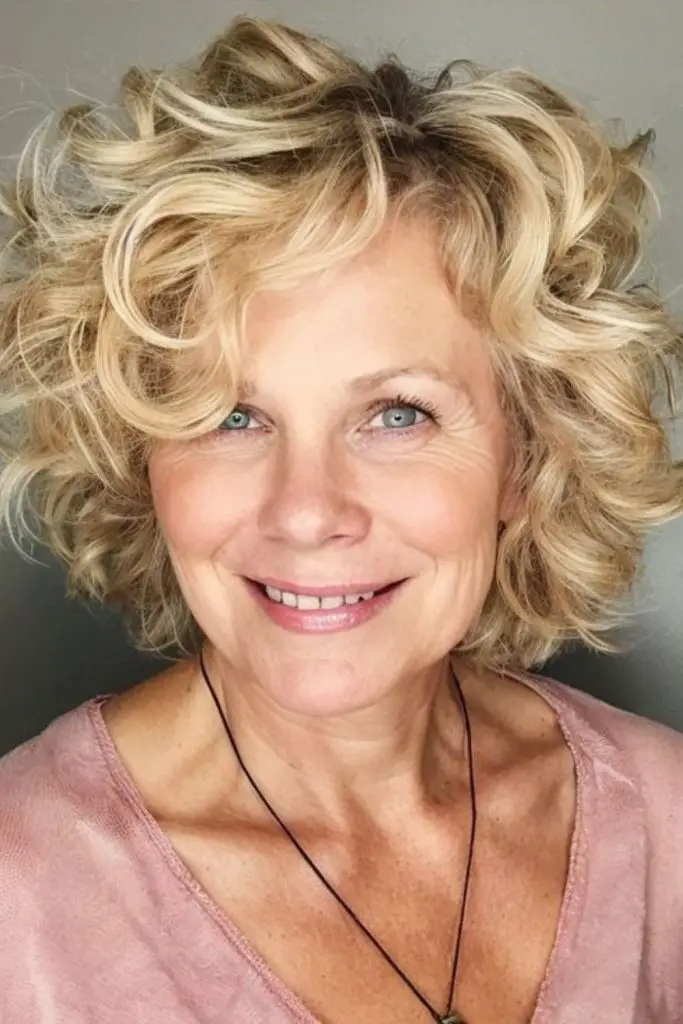 "Curls and side part for extra volume."