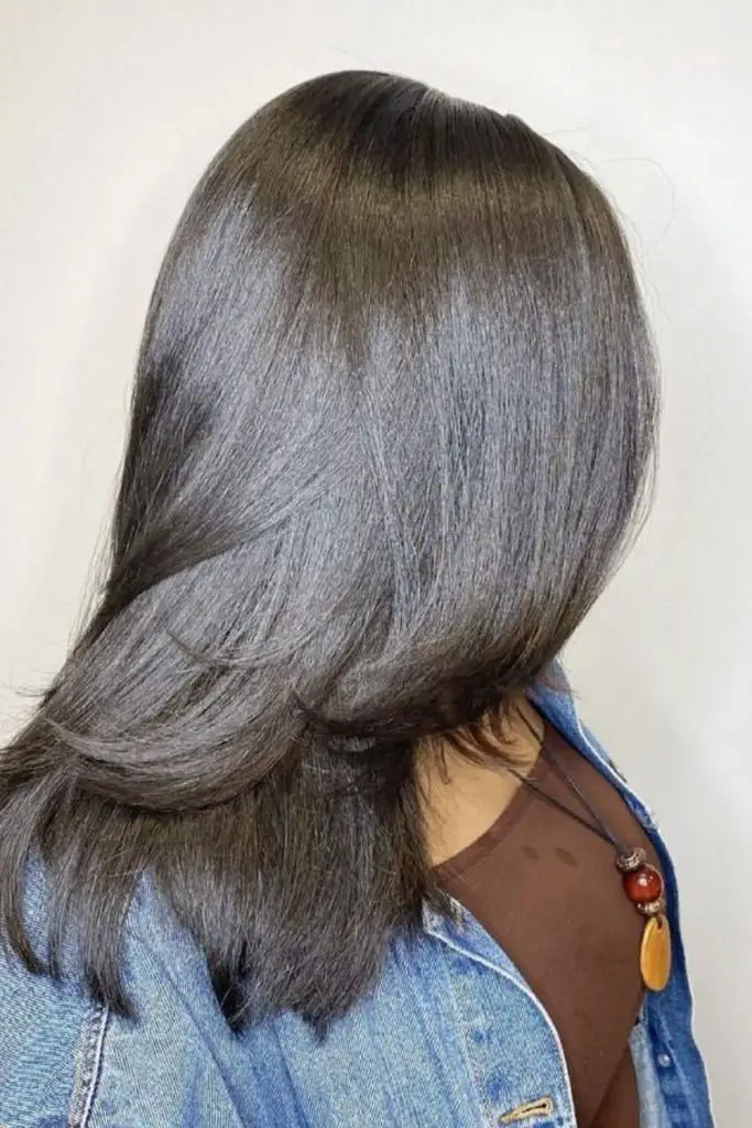 "Platinum blonde silk press with shine."