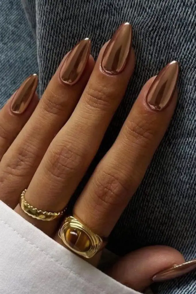 Metallic mocha nails with bronze glow.