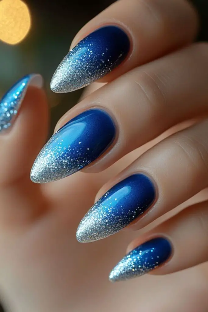 Midnight blue nails with silver stars.