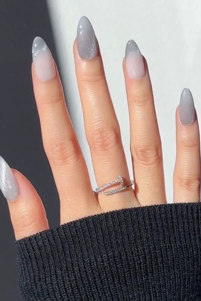 Grey nails with delicate silver shimmer.