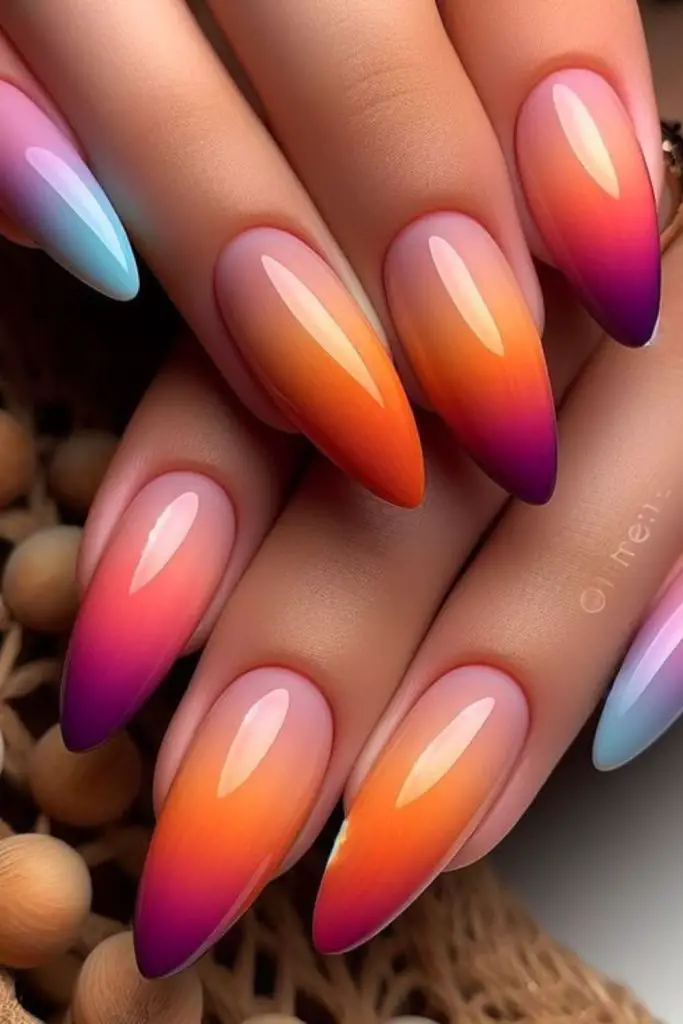 Ombre sunset nails with matte finish.