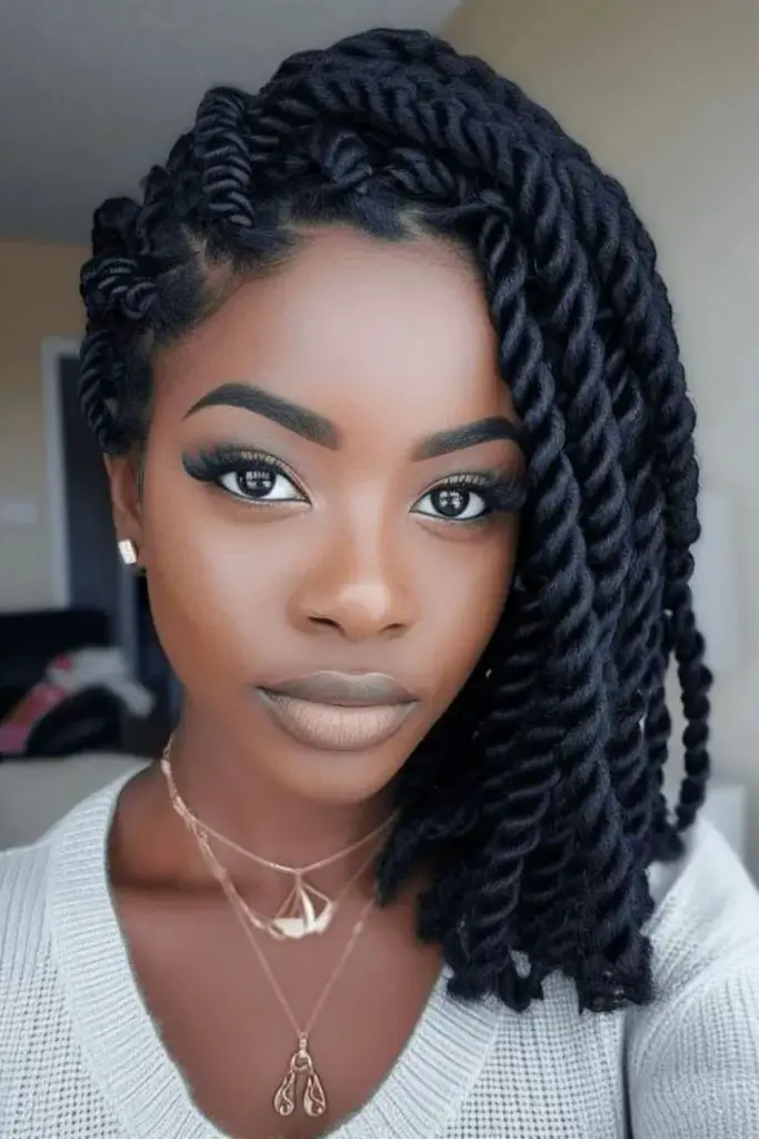 Voluminous lob with textured twists for added depth.