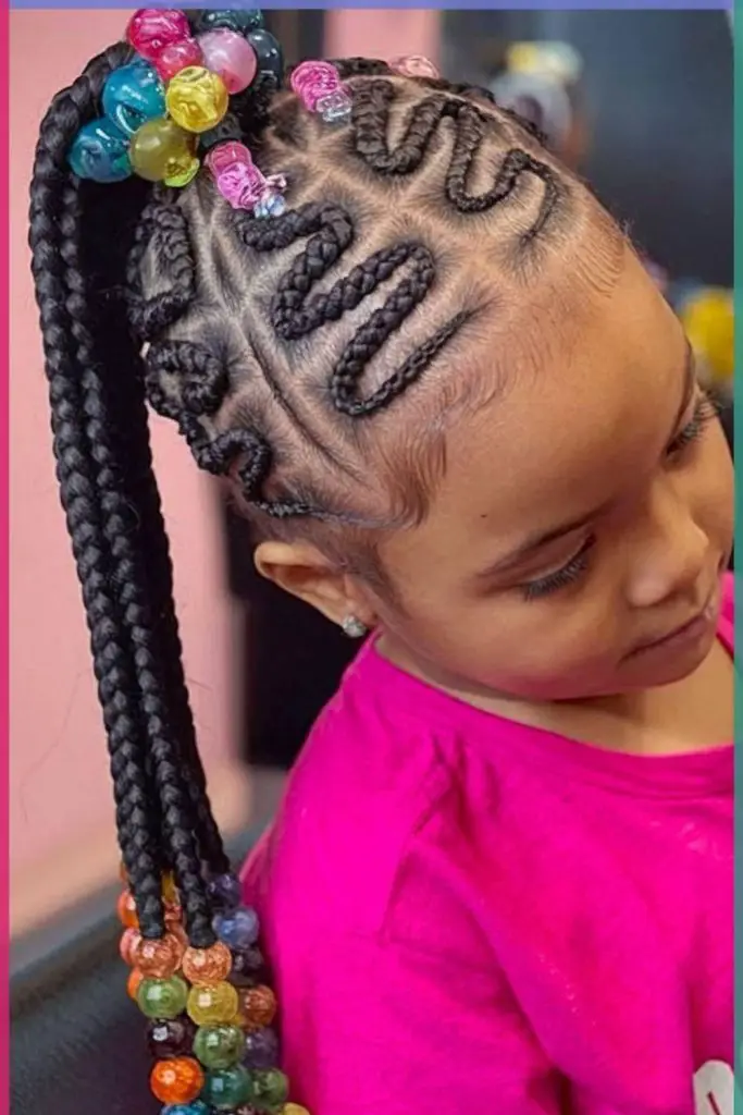 Zigzag cornrows with vibrant beads.
