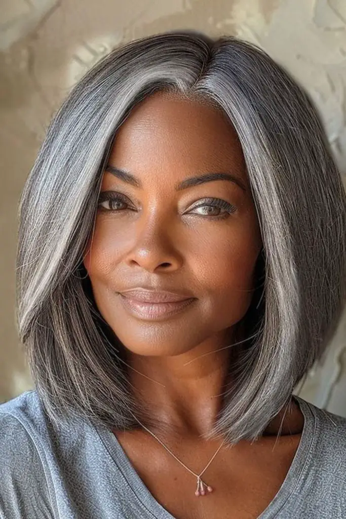 Asymmetrical gray lob cut for a modern flair.