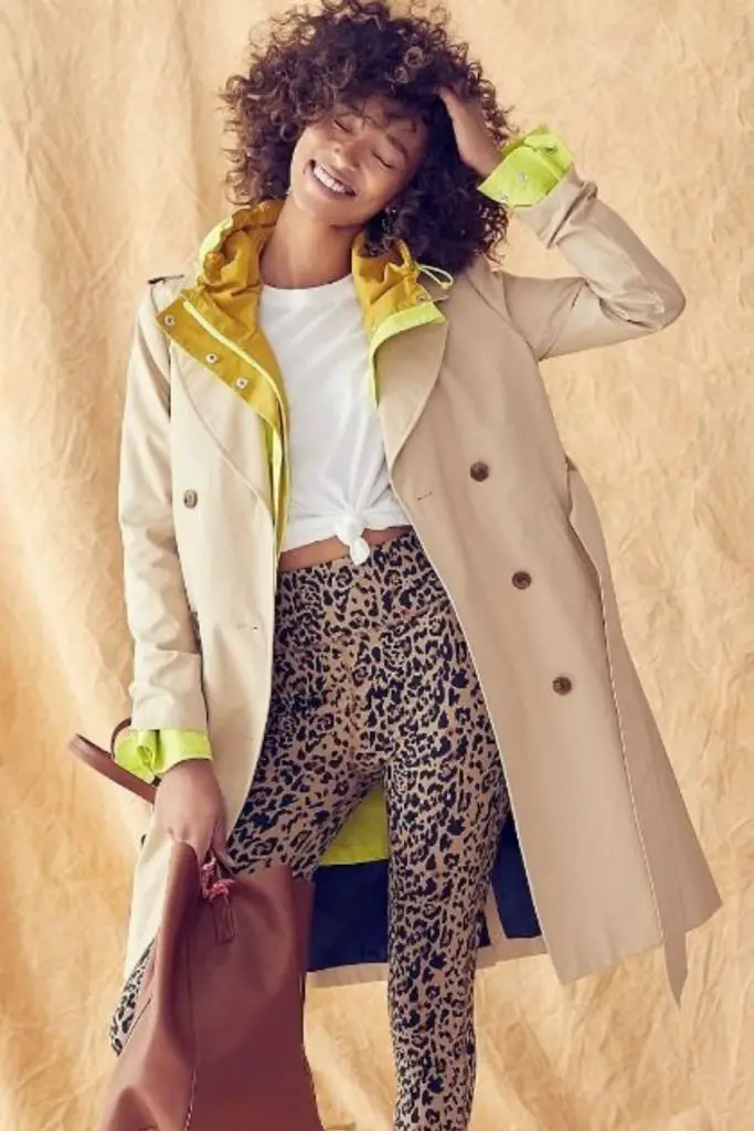 Classic trench coat exudes timeless elegance.