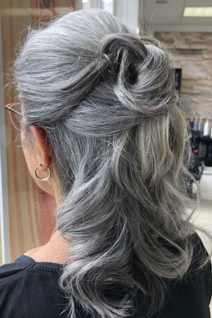 Timeless gray chignon hairstyle for an elegant appearance.