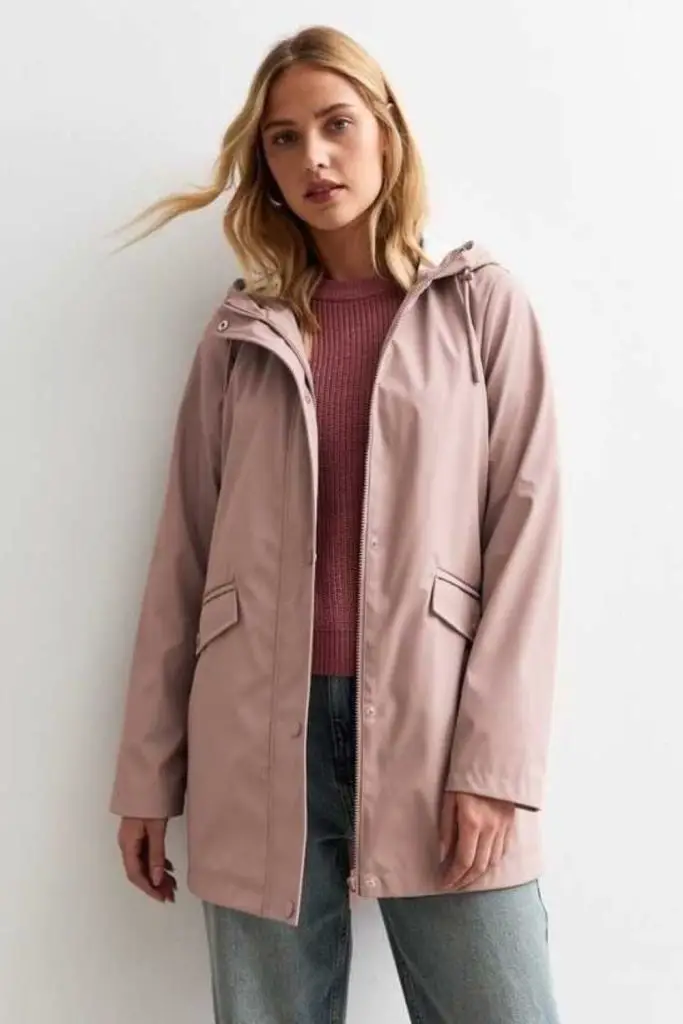 Hooded raincoat combines practicality with elegant style.