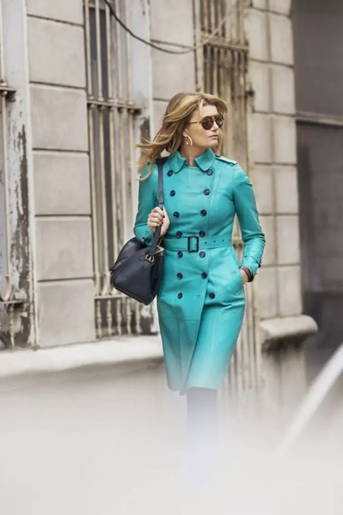 Raincoat with statement collar elevates rainy-day style.