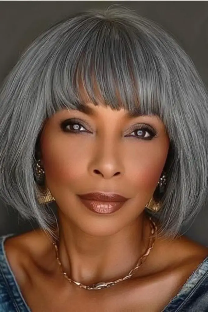 Playful textured fringe highlighting natural gray tones.